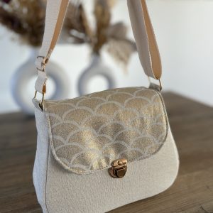 Sac à bandoulière unique en tissu beige et tissu écailles dorées